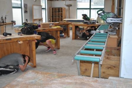 Bay of Plenty Polytechnic carpentry students Drop, Cover & Hold during ShakeOut